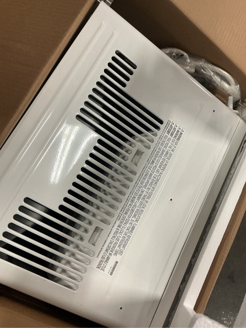 Condition photo showing As Is for 10,000 (doe) btu 115-volts window air conditioner cools 450 sq. ft. with wi-fi, remote and dehumidifier