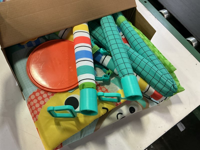 Condition photo showing As Is for bright starts wild wiggles baby activity gym & play mat with foldingtoy bar, newborn and up - green, 18.0" x 31.0" x 31.0" green wild wiggles