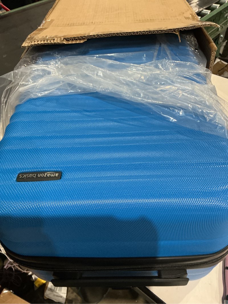 Condition photo showing Good Condition for amazon basics 21" hardside carry-on luggage, hardshell suitcase with wheels, expandable for up to 25% more space, with scratch-resistant surface, four multi-directional wheels, light blue light blue carry-on