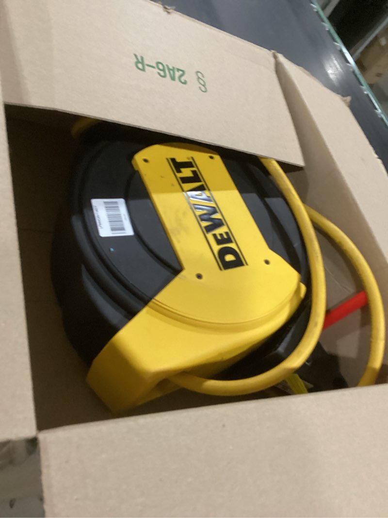 Condition photo showing As Is for dewalt 3/8 in. x 50 ft. enclosed air hose ree