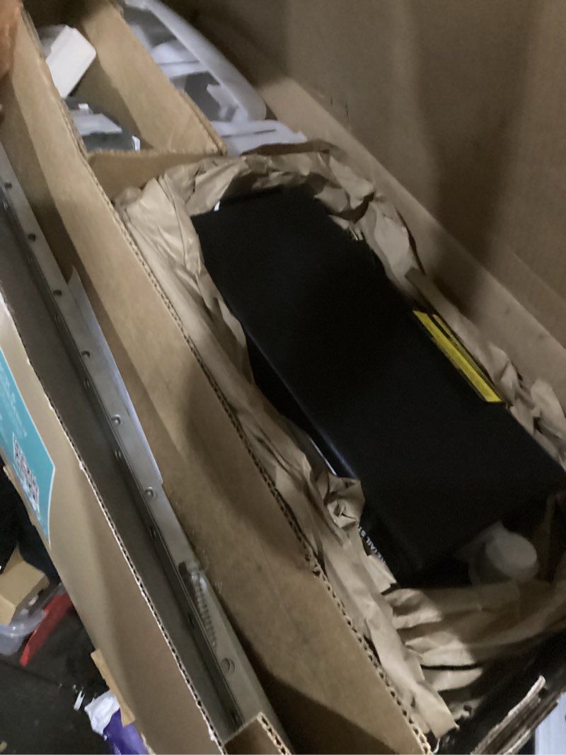 Condition photo showing As Is for genie chain drive 750 garage door opener with battery backup, surge protector and one single button garage door remote one remote & surge protector