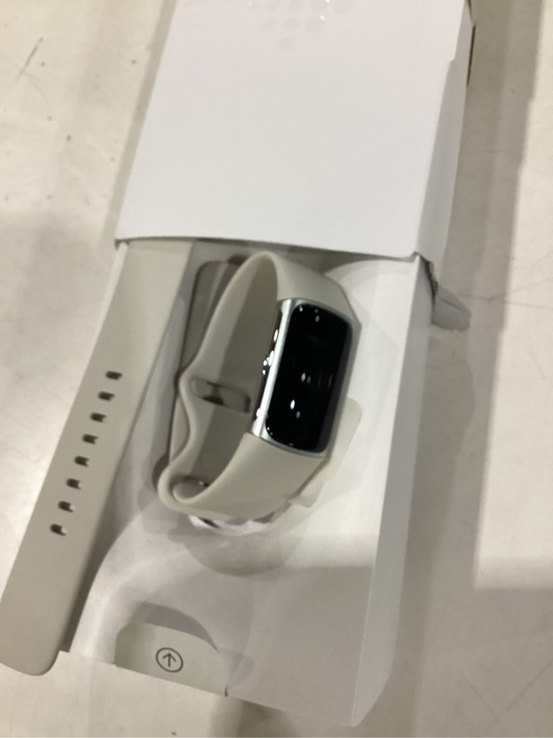 Condition photo showing As Is for not tested fitbit charge 6 fitness tracker with google apps, heart rate on exercise equipment, 6-months premium membership included, gps, health tools and more, porcelain/silver, one size (s & l bands included) silver case w/ white band tracker