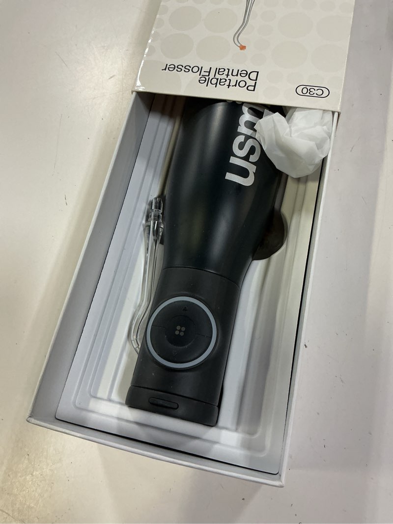 Condition photo showing Good Condition for usmile c30 cordless water flosser, 300ml large tank, 5 pressure levels deep clean, s-shaped nozzles for braces & sensitive gums, usb-c rechargeable, ipx7 waterproof, portable travel & home use(black)