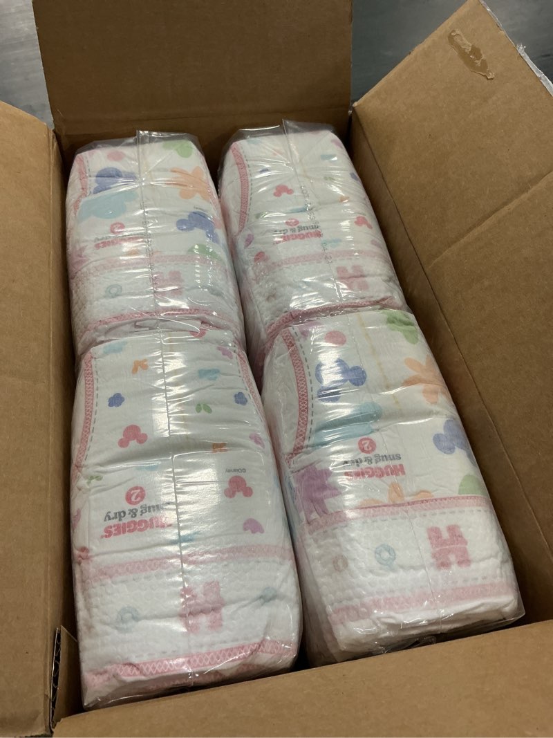 Condition photo showing New/Like New for Huggies Size 2 Diapers, Snug & Dry Baby Diapers, Size 2 (12-18 lbs), 116 Count, Packaging May Vary Size 2 116