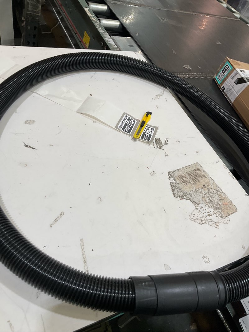 Condition photo showing As Is for vacuum hose