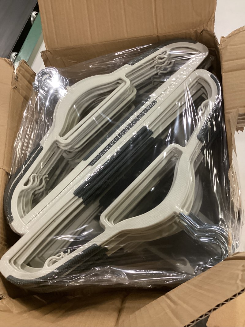 Condition photo showing New/Like New for 60 pack heavy duty plastic hangers, non slip clothes hangers with rubber pads and 360° hook - thin space saving hanger, closet organizer for shirt, pants, suit, skirt,coat - gray gray 60 pack