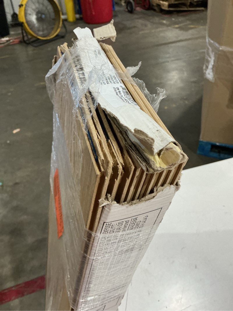 Condition photo showing As Is for rockwood oak 7 mm t x 7.64 in. w laminate wood flooring (24.17 sqft/case)