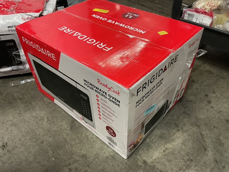 Condition photo showing Good Condition for Frigidaire EMW112OAMZ Stainless Steel Microwave Oven, Multi Function, Programmable, 1.1 Cu Ft 1000-Watt, residential kitchen, Stainless