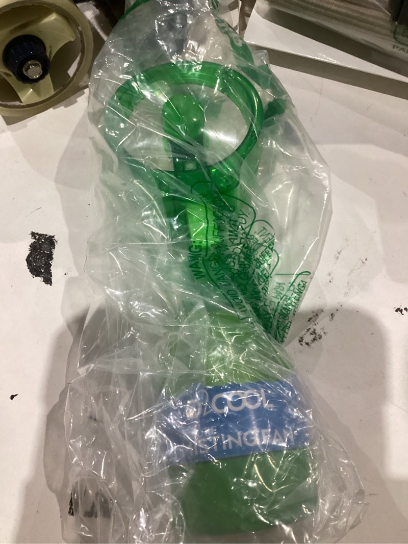 Condition photo showing As Is for o2cool deluxe handheld misting fan battery powered green | yes green single