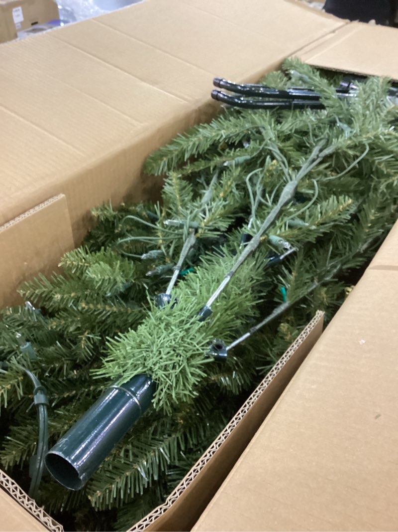 Condition photo showing As Is for National Tree Company 6.5 ft Pre-Lit Dunhill Fir Artificial Christmas Tree, 650 Clear Lights, 1,838 Tips, Includes Stand, Green 6ft 6in Tree