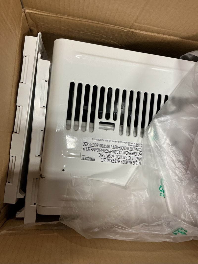 Condition photo showing Good Condition for 5,000 btu 115-volt window air conditioner 150 sq. ft. rooms with remote in white