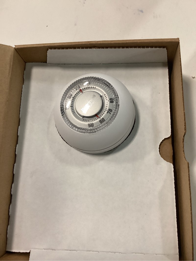 Condition photo showing As Is for honeywell home heating and cooling dial thermostat