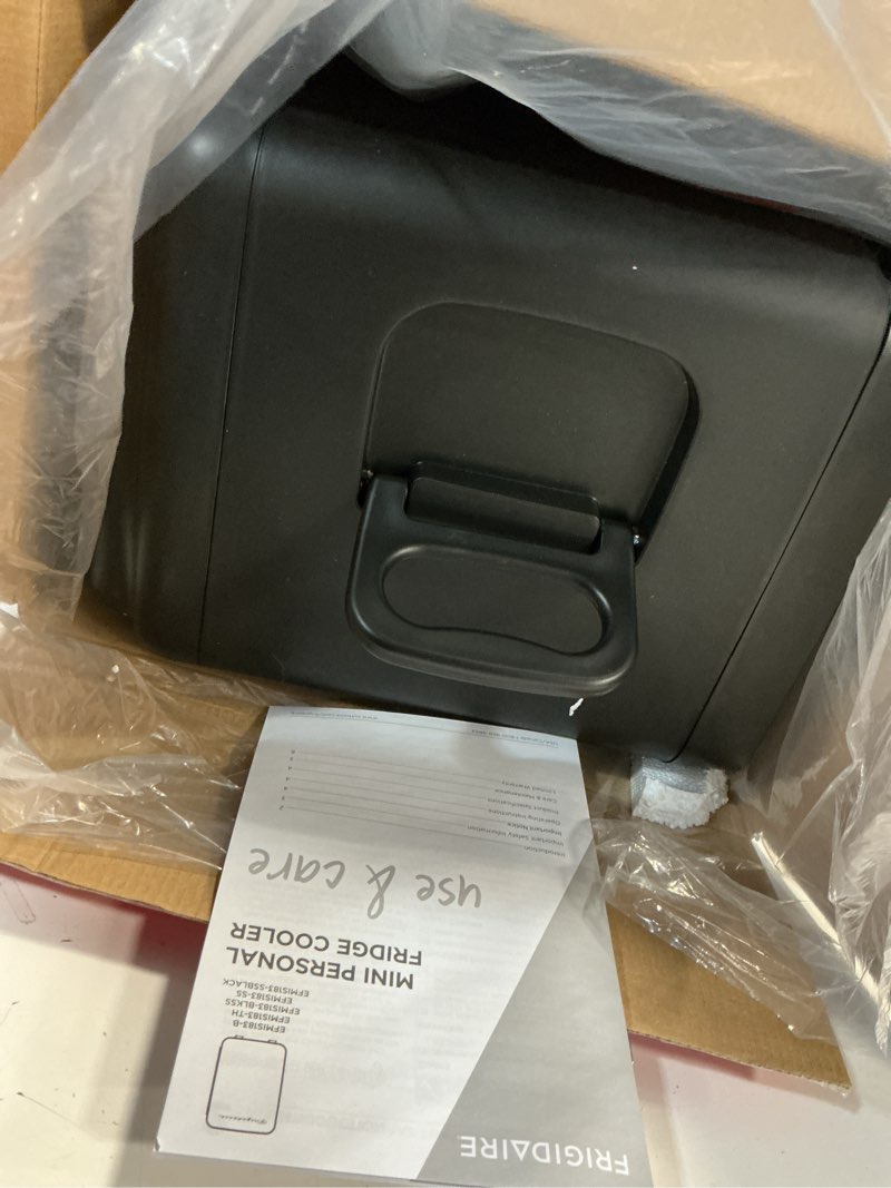 Condition photo showing As Is for frigidaire portable 10l, 15-can mini fridge brushed stainless rugged refrigerator, efmis188-ss