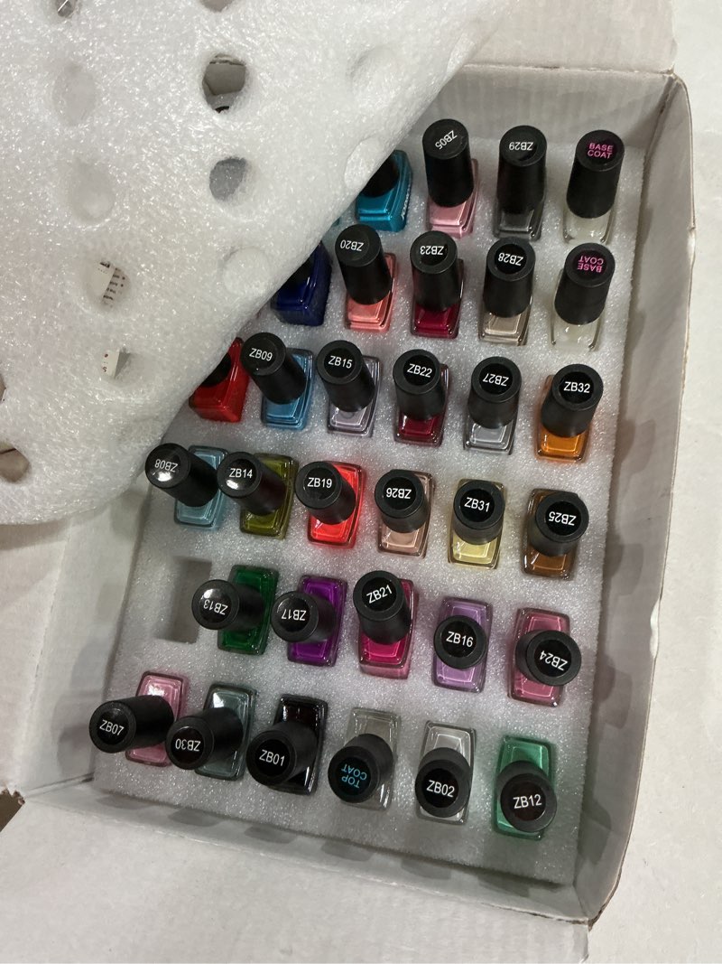Condition photo showing Good Condition for jodsone 31 colors quick dry nail polish set 0.17 fl.oz,valentines nail polish set with 1 top coat & 2 base coat,totaling 35pcs,air dry & long lasting nail art diy home manicure gift for women a32-zb01-zb32