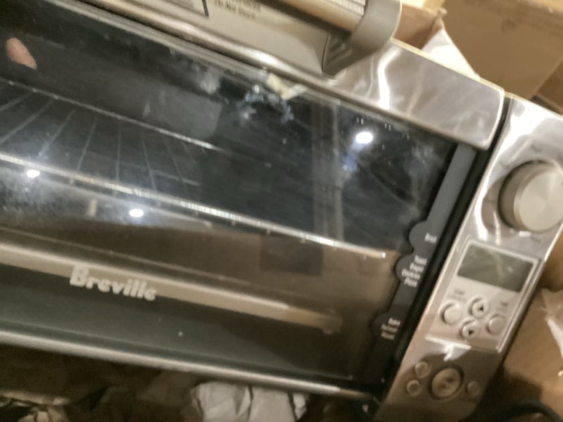 Condition photo showing As Is for Not tested ****Breville BOV450XL Mini Smart Countertop Oven and Toaster Oven, Small, Brushed Stainless Steel