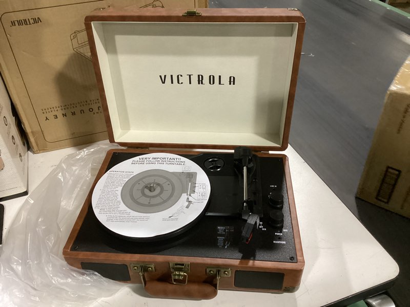 Condition photo showing As Is for victrola journey bluetooth portable suitcase record player – with built-in speakers, 3 speed vinyl record player, rca out, headphone jack (brown)