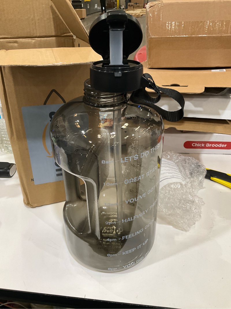 Condition photo showing Good Condition for AQUAFIT 128 oz Water Bottle with Time Marker - Straw & Chug Lid - BPA Free 1 Gallon Gym Water Bottle with Handle - Big Gallon Jug (Gray, 128 Ounces) 128 Ounces Gray