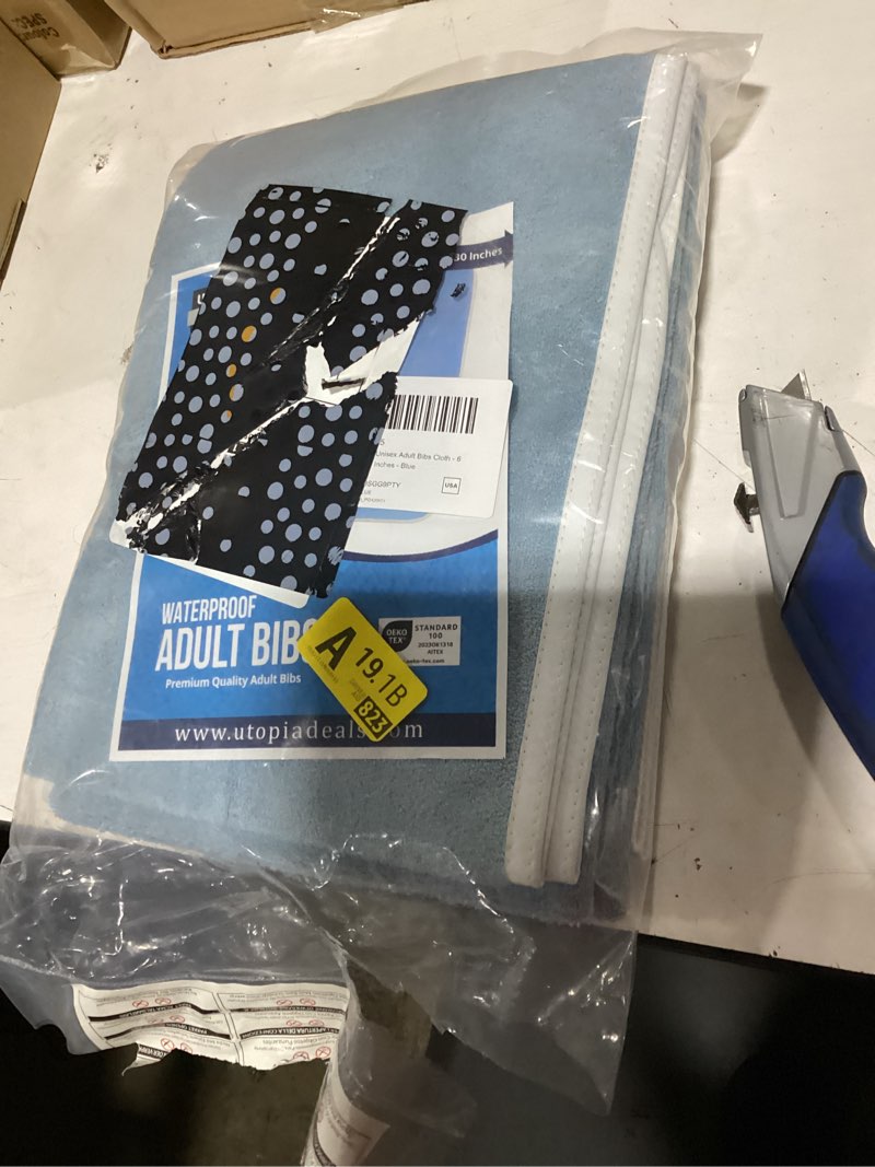 Condition photo showing New/Like New for utopia towels 6 pack premium unisex adult bibs for elderly women men, waterproof bib for eating, adjustable and washable (blue) pack of 6 blue