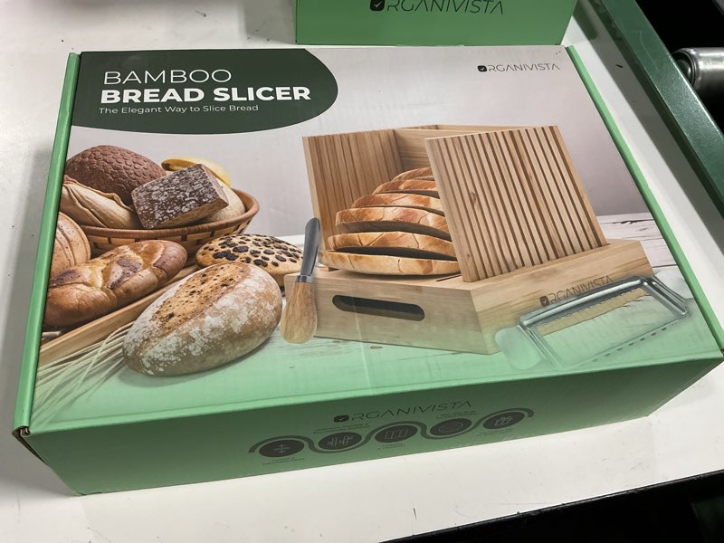 Condition photo showing New/Like New for Adjustable bread loaf slicer + bread slicer guide for sourdough; sandwich bread slicer, butter cutter and spreader knife + foldable design, crumb tray, non-slip base, compact storage