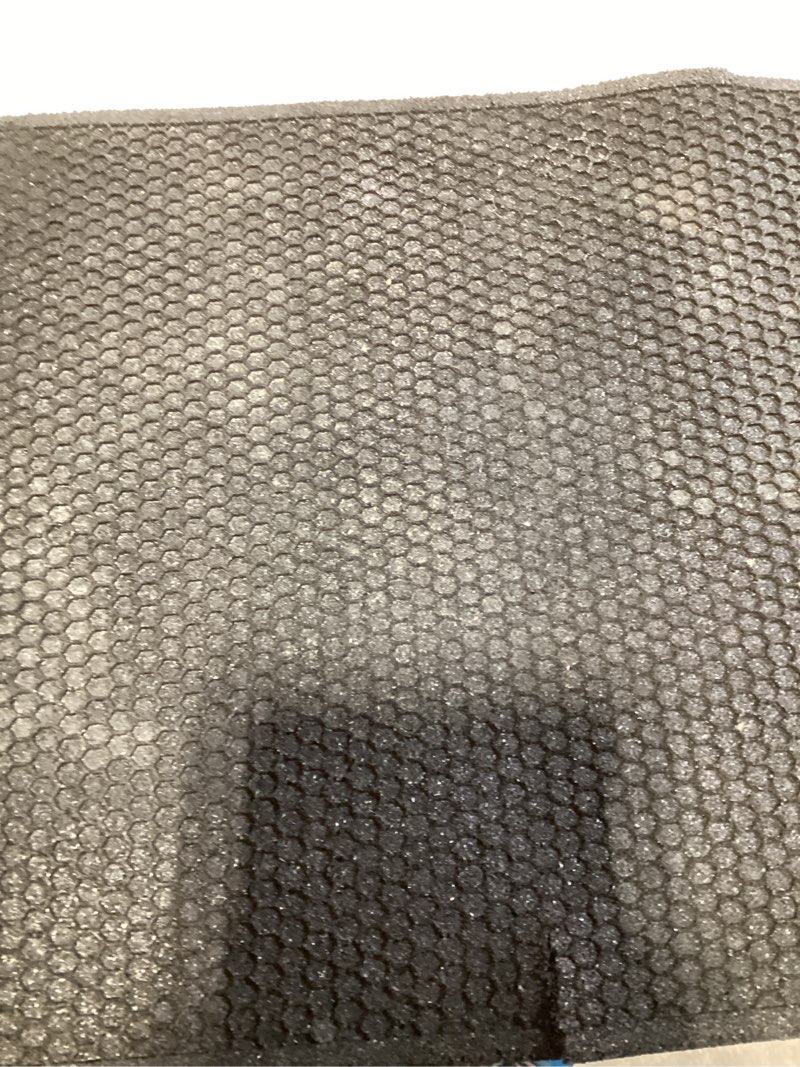 Condition photo showing As Is for black outdoor mat