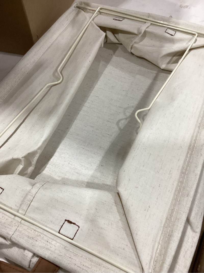 Condition photo showing As Is for StorageWorks 45L Extra Large Fabric Storage Bins with PU Handles, Storage Baskets for Organizing, Large Laundry Basket, 1-Pack, Beige, 19\" L X 13.25\" W X 11\" H Beige 19\" L x 13 ¼\" W x 11\" H