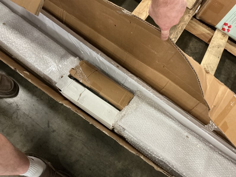 Condition photo showing As Is for smartstandard 42 x 84 inch white sliding mdf barn door with 7ft black sliding door hardware kit & handle, pre-drilled ready to assemble, waterproof pvc coating, h-frame