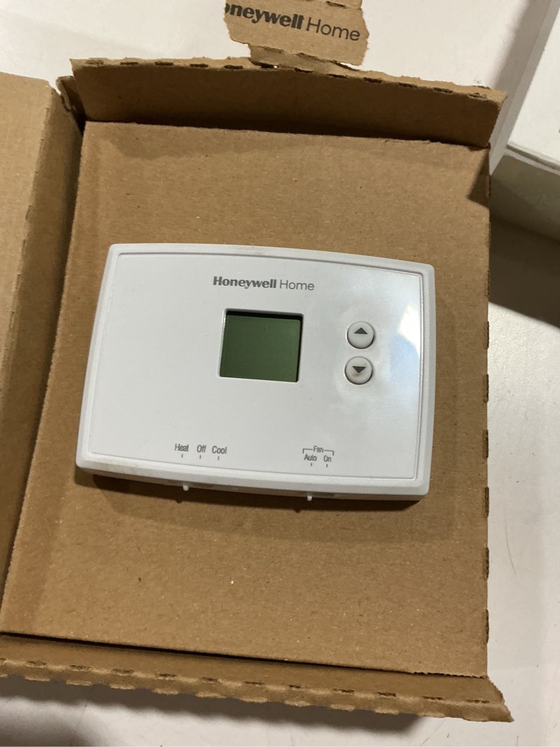 Condition photo showing As Is for Honeywell RTH111B1016/A Non-Programmable Thermostat