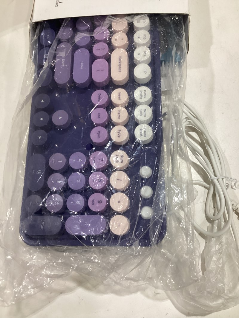 Condition photo showing Good Condition for dilter wired keyboard, full-sized typewriter keyboards, usb plug and play office keyboard with number pad, caps indicators, foldable stands for windows, pc, laptop, desktop (purple) purple gradient