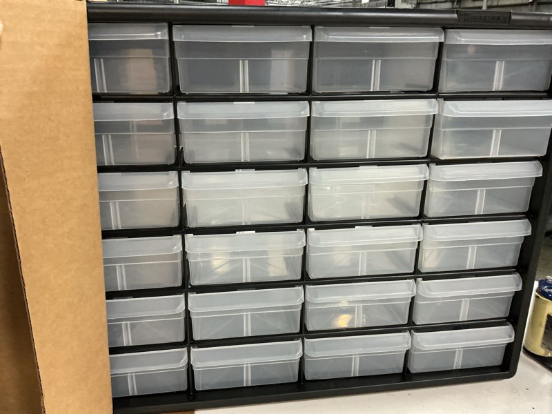 Condition photo showing New/Like New for akro-mils 24-drawer plastic drawer storage cabinet for garage organization, bead organizer, building bricks storage, teacher toolbox, makeup organizer, 20" w x 6" d x 16" h, 10724 black 24 drawer