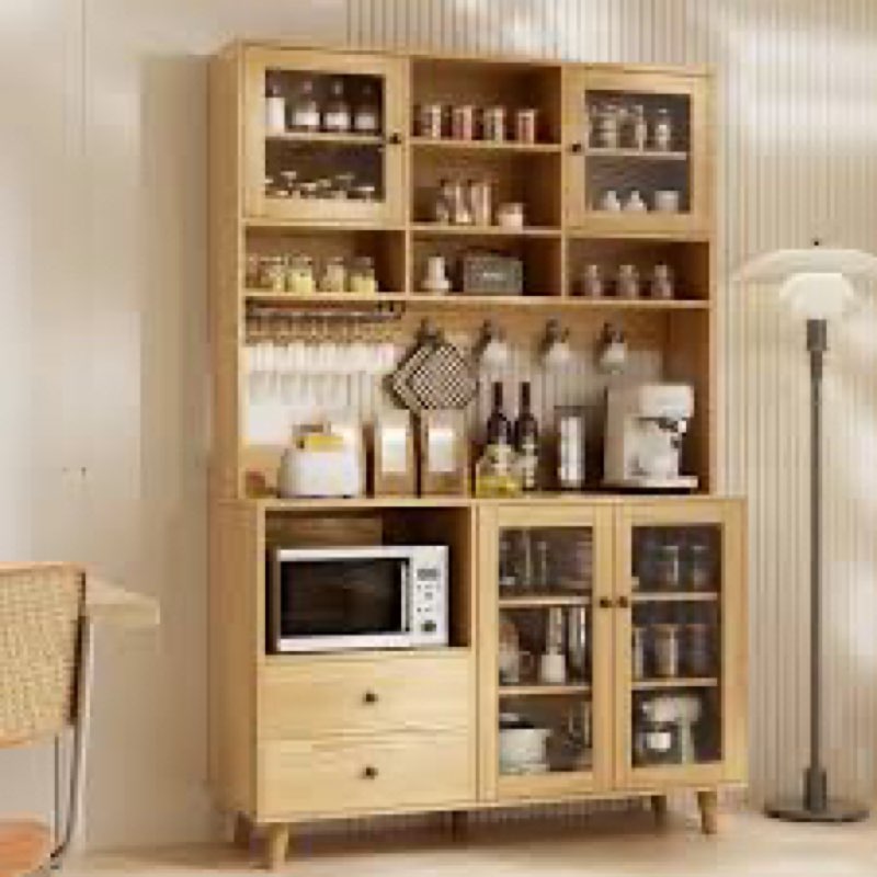 kitchen pantry with glass door and microwave shelf