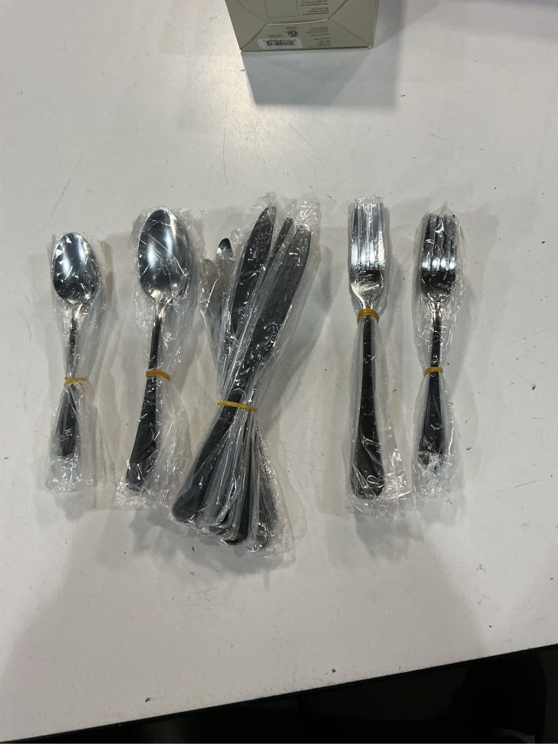 Condition photo showing Good Condition for 45-piece silverware set with serving utensils set, heavy duty stainless steel flatware set,cutlery set for home kitchen restaurant wedding, dishwasher safe