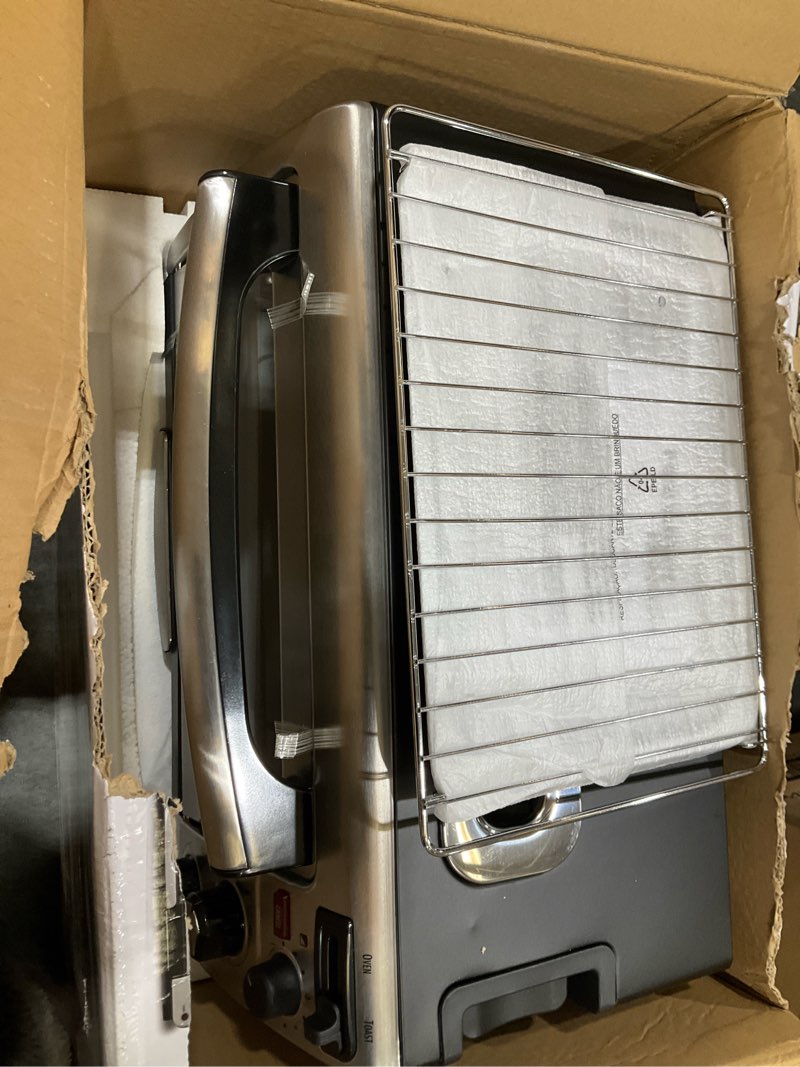 Condition photo showing As Is for hamilton beach 2-in-1 countertop toaster oven and long slot 2 slice toaster, 60 minute timer and automatic shut off, shade selector, stainless steel (31156)