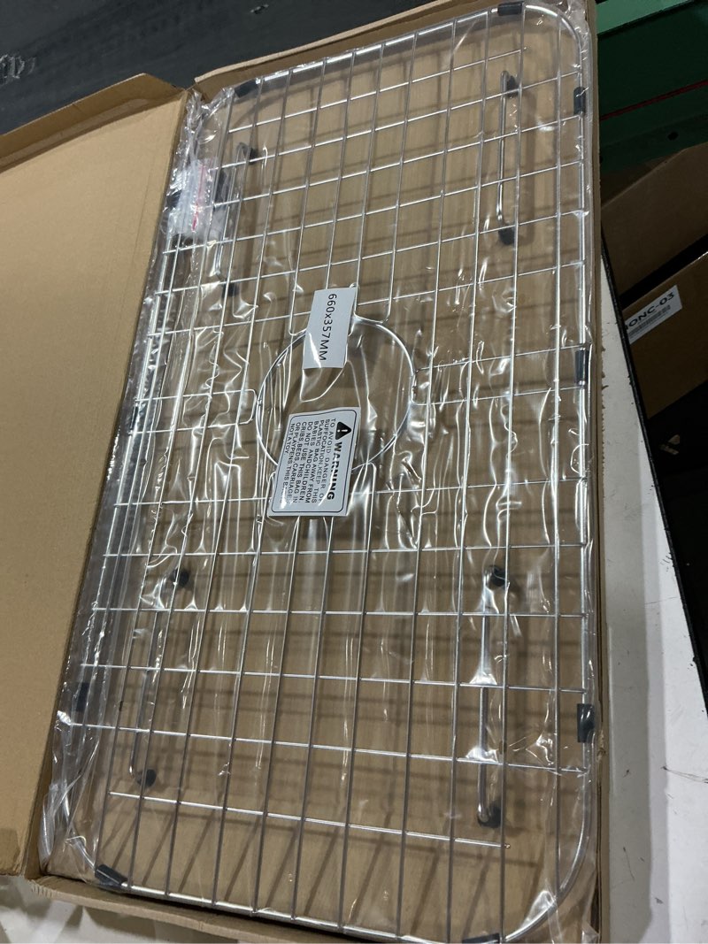Condition photo showing New/Like New for sink protector grid 26-1/16" x 14-1/16", centered drain with corner radius 3-1/2", 304 stainless steel material sink grid - centered drain 26-1/16" x 14-1/16" centered drain