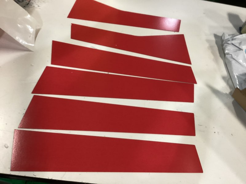 Condition photo showing As Is for decals for vehicle/boat (red)
