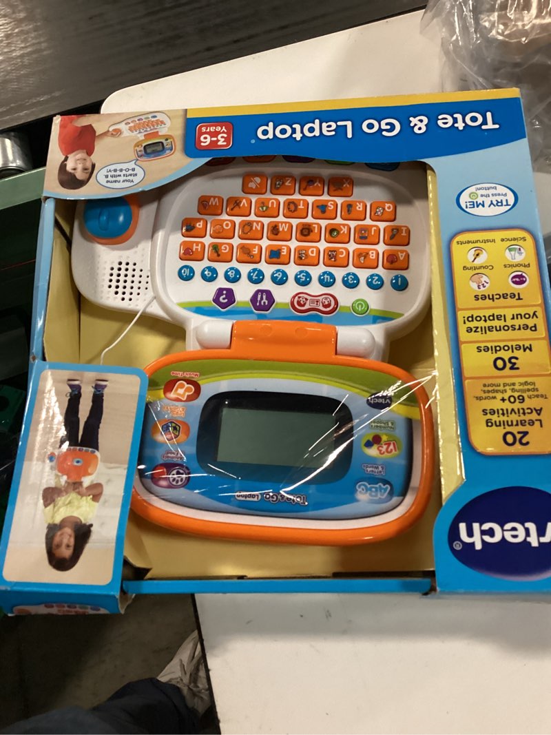 Condition photo showing Good Condition for VTech Tote and Go Laptop, Orange Orange Standard Packaging