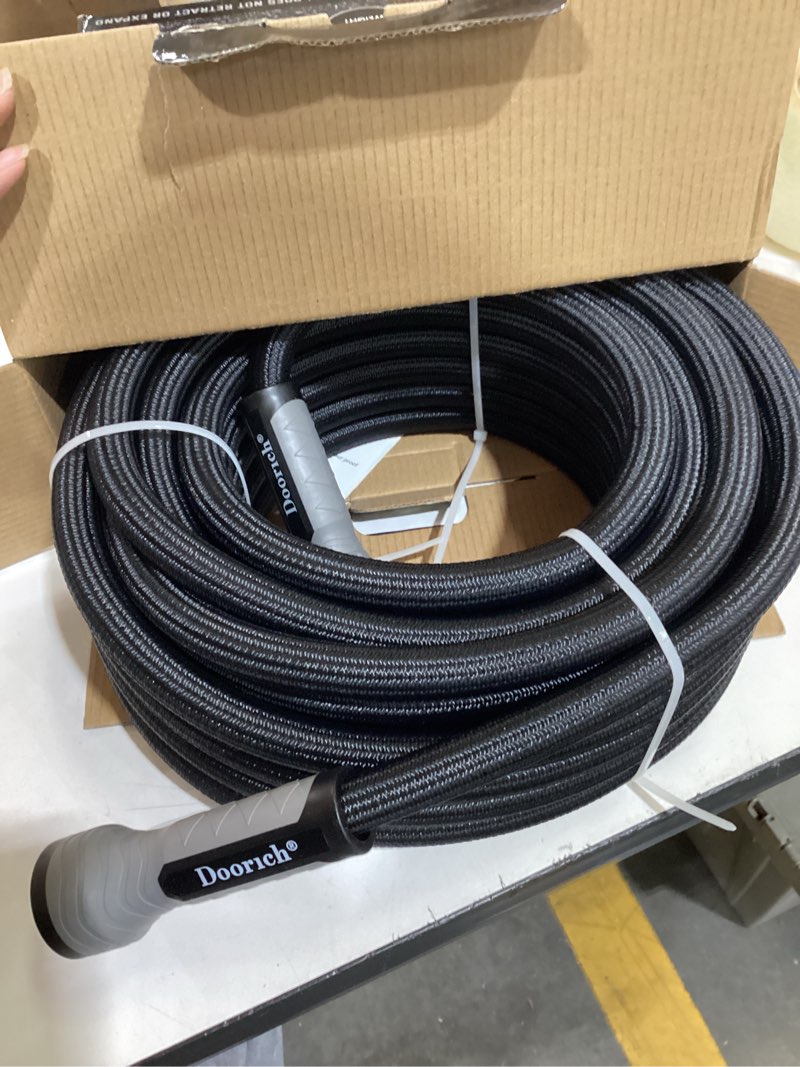 Condition photo showing Good Condition for garden hose, flexible ultra lightweight durable, kink-free water hose with 10 function sprayer - non-shrinking, easy to store, all-weather, high-pressure, black (50 ft) black 50ft