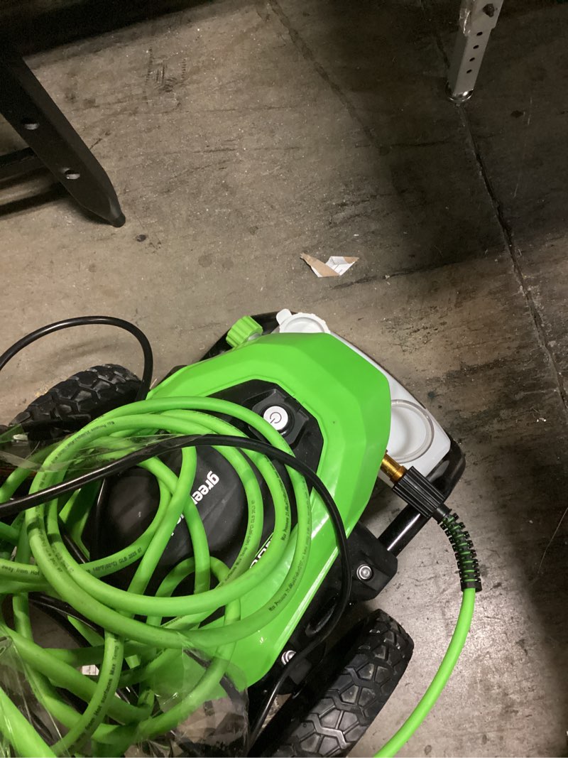 Condition photo showing As Is for greenworks 2200-psi 1.2-gpm cold water electric pressure washer with 4 spray tips