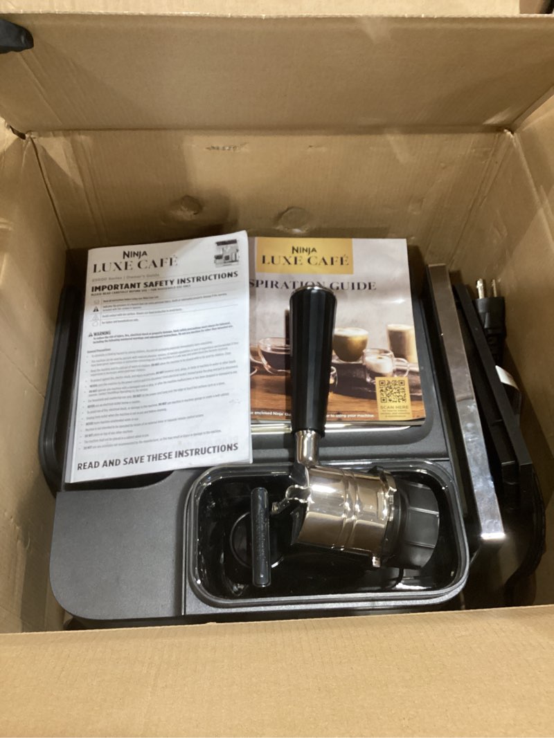 Condition photo showing As Is for Ninja Luxe Café 3-in-1 Espresso, Drip Coffee and Cold Brew Machine | Integrated Coffee Grinder, Milk Frother, Assisted Tamper & Built-In Espresso Accessory Storage | Stainless Steel | ES601 Luxe Cafe Stainless Steel