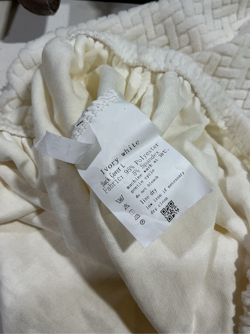 Condition photo showing As Is for ivory white large back cover