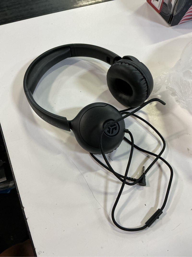 Condition photo showing As Is for jlab studio 2 wired headphones, black, cloud foam comfort, foldable, in-line mic, lab quality sound