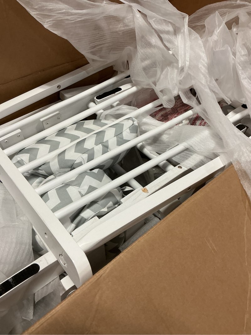 Condition photo showing Good Condition for Storkcraft Premium Hoop Glider and Ottoman (White Base, Gray Chevron Cushion) – Padded Cushions with Storage Pocket, Smooth Rocking Motion, Easy to Assemble, Solid Hardwood Base White/Gray Chevron