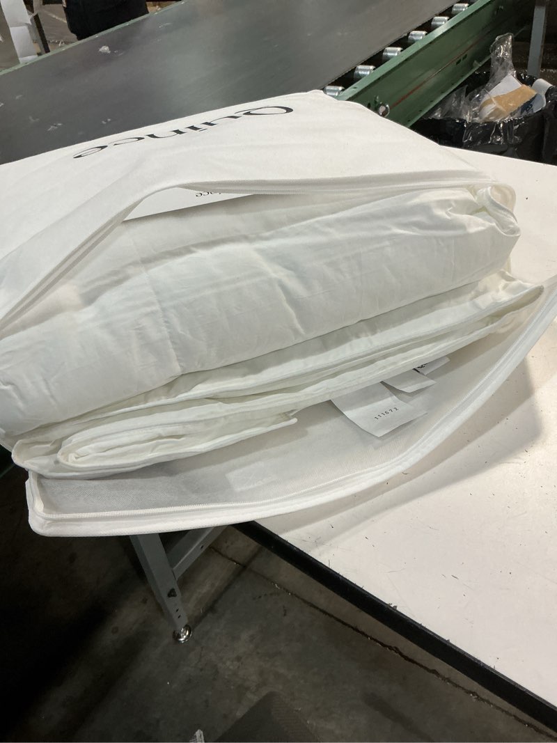 Condition photo showing Good Condition for quince premium down alternative comforter color:white size twin 