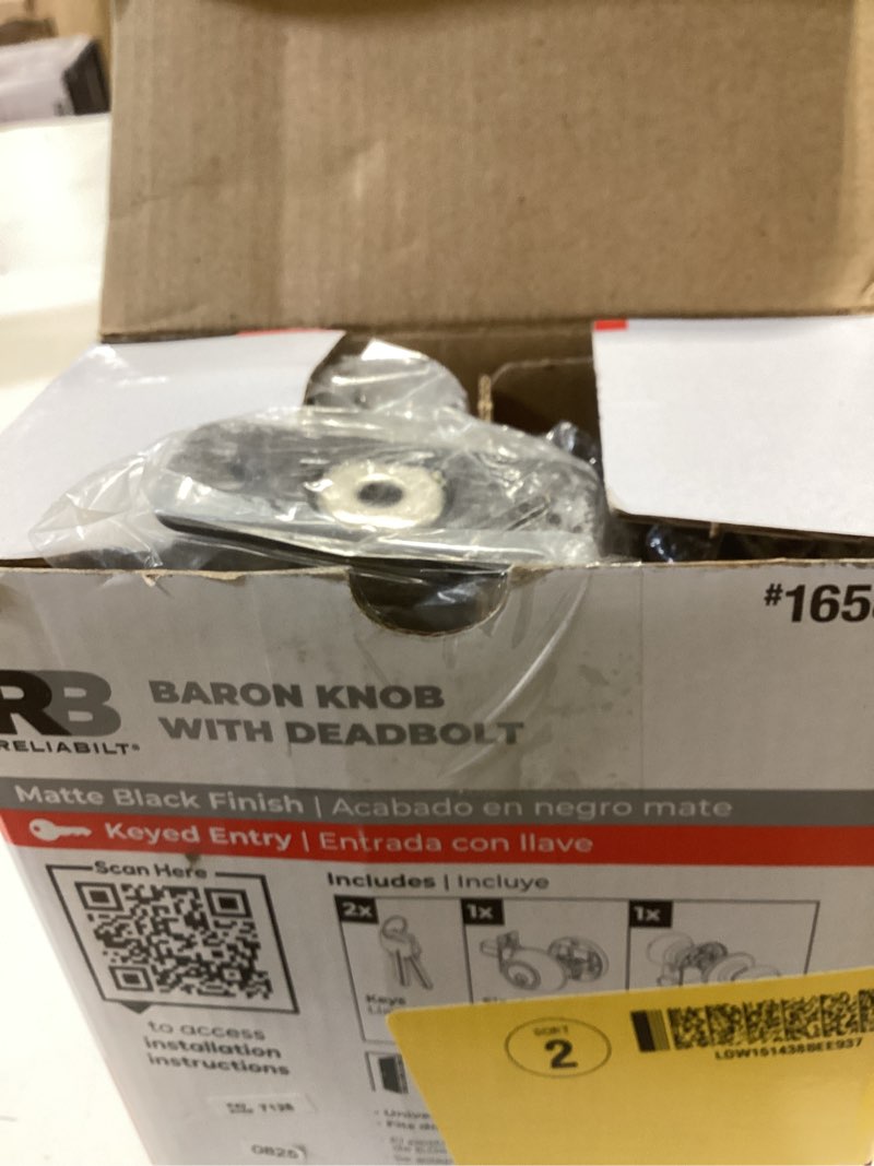 Condition photo showing As Is for reliabilt baron matte black exterior single-cylinder deadbolt keyed entry door knob combo pack