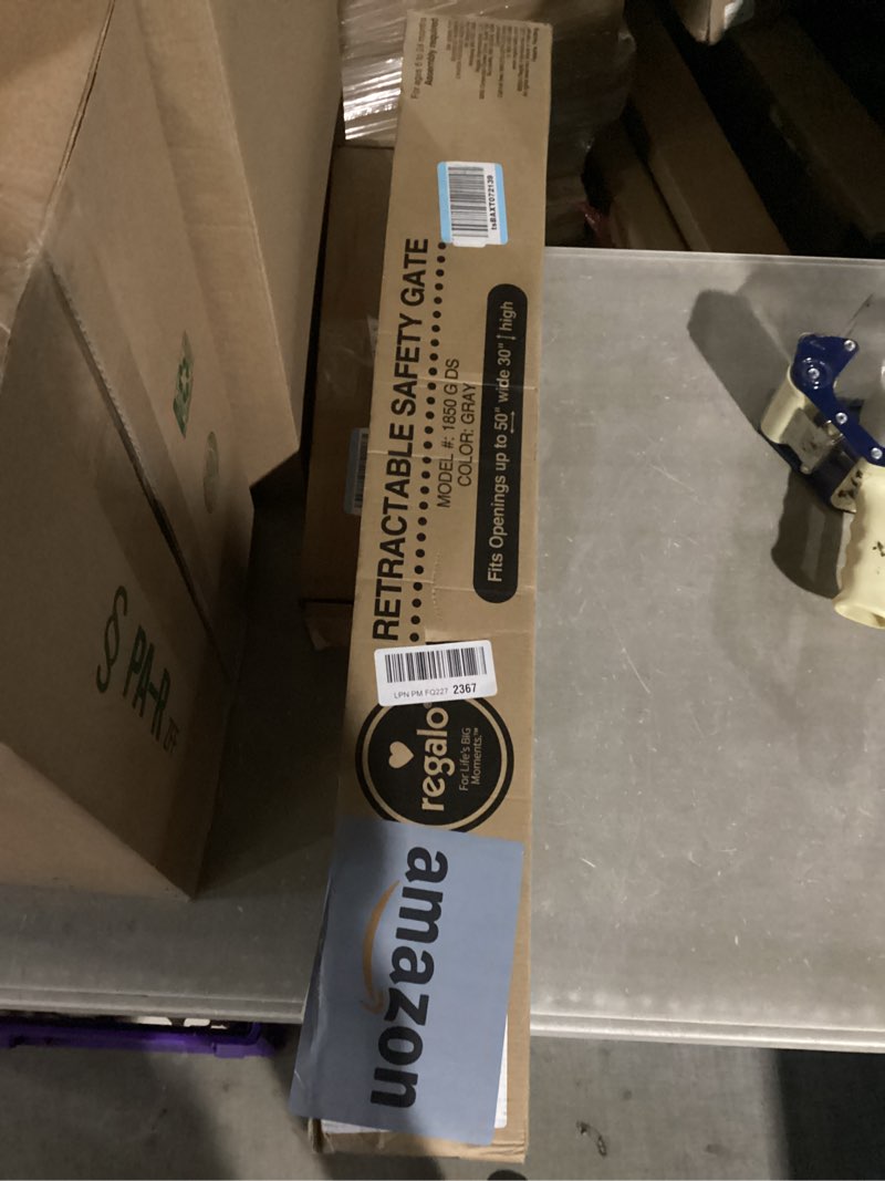 Condition photo showing New/Like New for regalo extra wide retractable baby gate, award winning brand, expands up to 50" wide, easy install, includes installation template, locking indicator