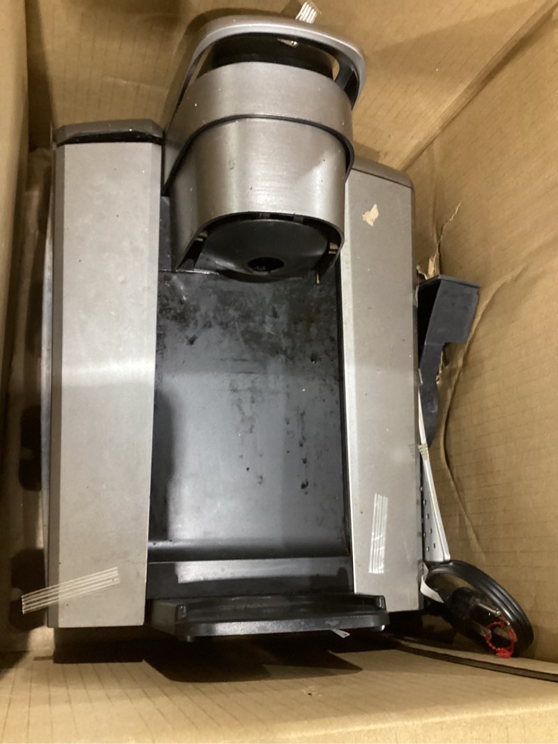 Condition photo showing As Is for keurig k-elite single serve k-cup pod coffee maker, with strength and temperature control, iced coffee capability, 8 to 12oz brew size, programmable, brushed slate