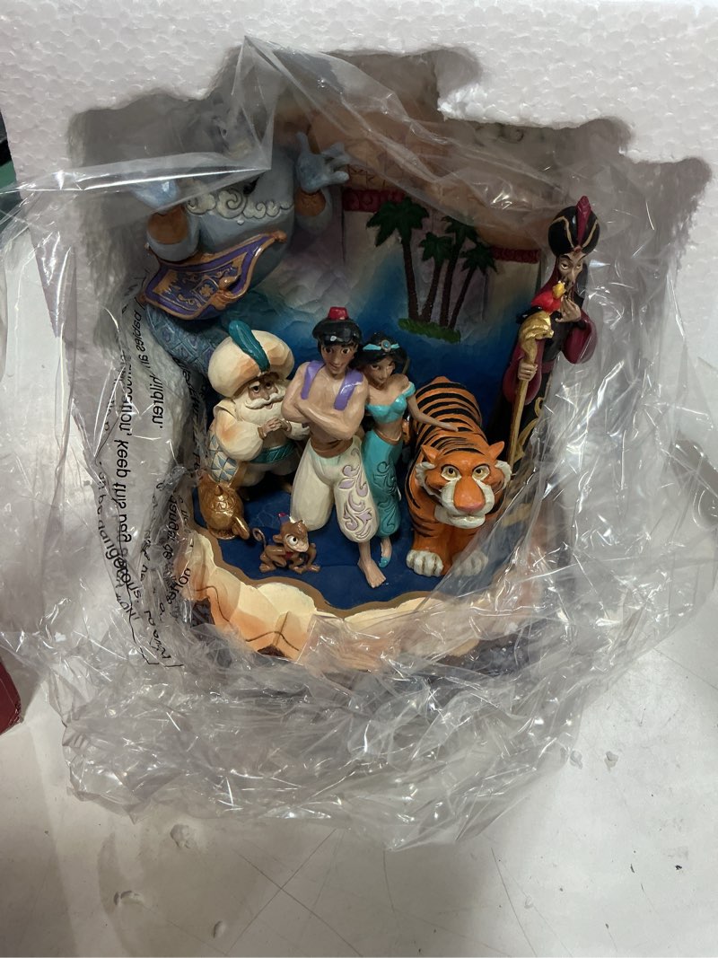 Condition photo showing New/Like New for enesco disney traditions by jim shore aladdin characters carved by heart figurine, 7.67 inch, multicolor