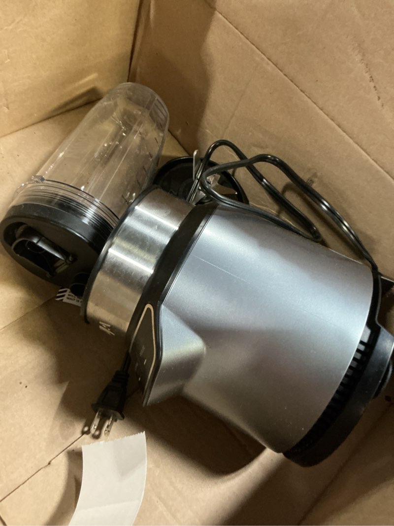 Condition photo showing As Is for ninja | blender | nutri pro | single serve | for smoothies, salsa, shakes and frozen drinks | includes 2 smoothie cups & lids | crushes ice, fruit & veggies |silver | bn401 auto blend 1000-peak-watts