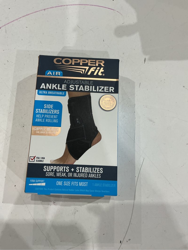 Condition photo showing As Is for copper fit adjustable compression ankle stabilizer for support and pain relief
