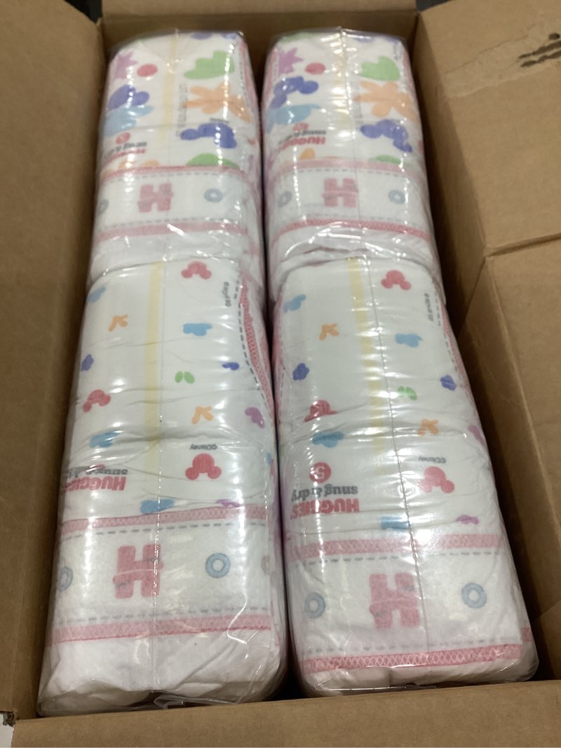 Condition photo showing Good Condition for huggies size 5 diapers, snug & dry baby diapers, size 5 (27+ lbs), 84 count, packaging may vary size 5 84