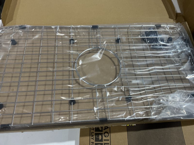 Condition photo showing As Is for Serene Valley Sink Bottom Grid 24-1/8" x 12-5/8", Centered Drain with Corner Radius 1-1/2", Sink Protector NLW2412C